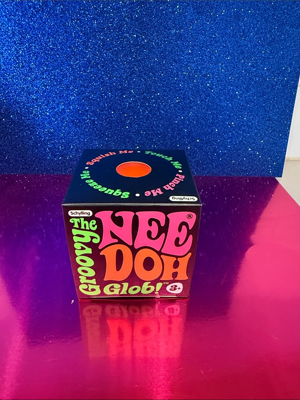The Groovy NeeDoh Glob! Stress Ball Toy - Orange